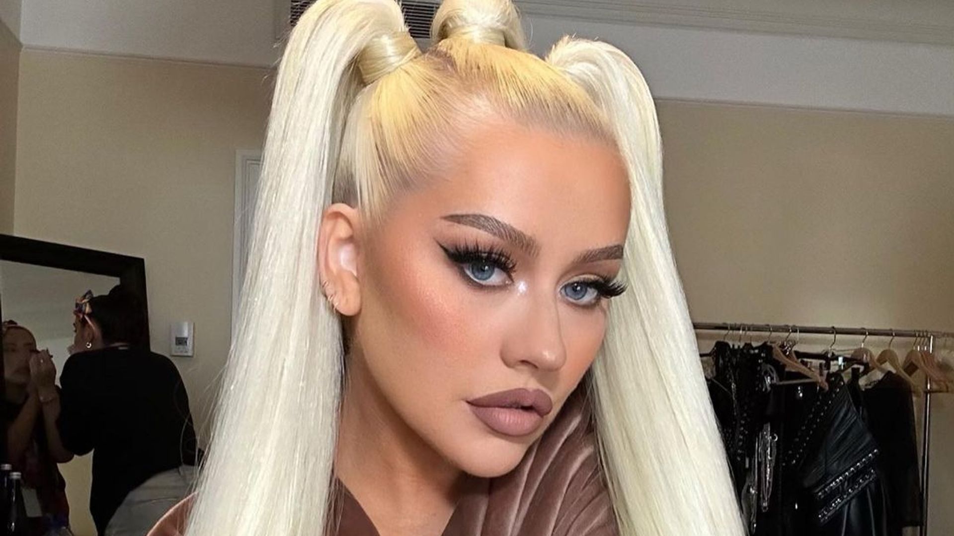 Christina Aguilera's Edited Photos Spark Debate: Natural Beauty Vs. Airbrushing Christina Aguilera's Edited Photos Spark Debate: Natural Beauty Vs. Airbrushing
