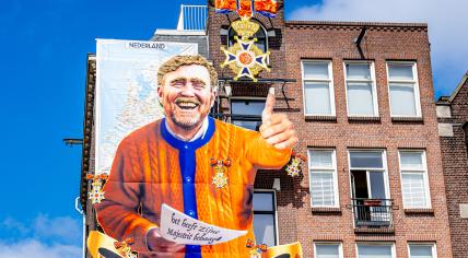 Kings Day In Amsterdam: New Mural At Cafe Honors Marjolein Faber's Ribbon Gate Artwork Kings Day In Amsterdam: New Mural At Cafe Honors Marjolein Faber's Ribbon Gate Artwork