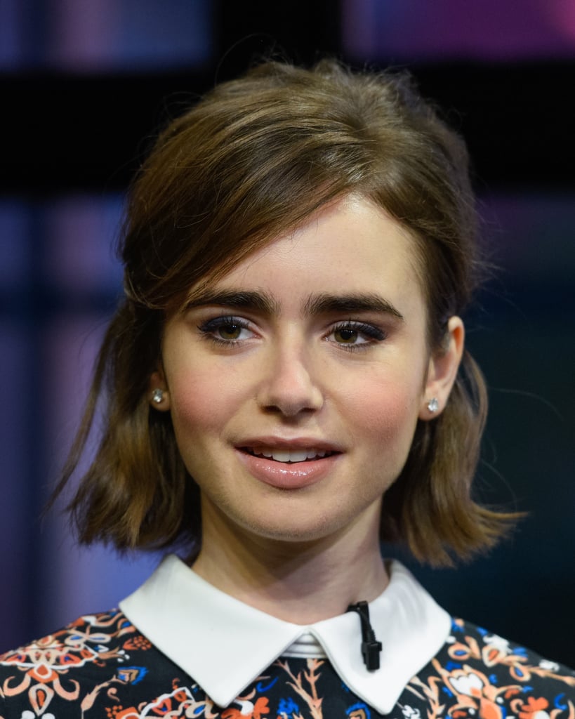 Lily Collins' Beauty Look: Bob Haircut, Bushy Brows, And Nude Lips Lily Collins' Beauty Look: Bob Haircut, Bushy Brows, And Nude Lips