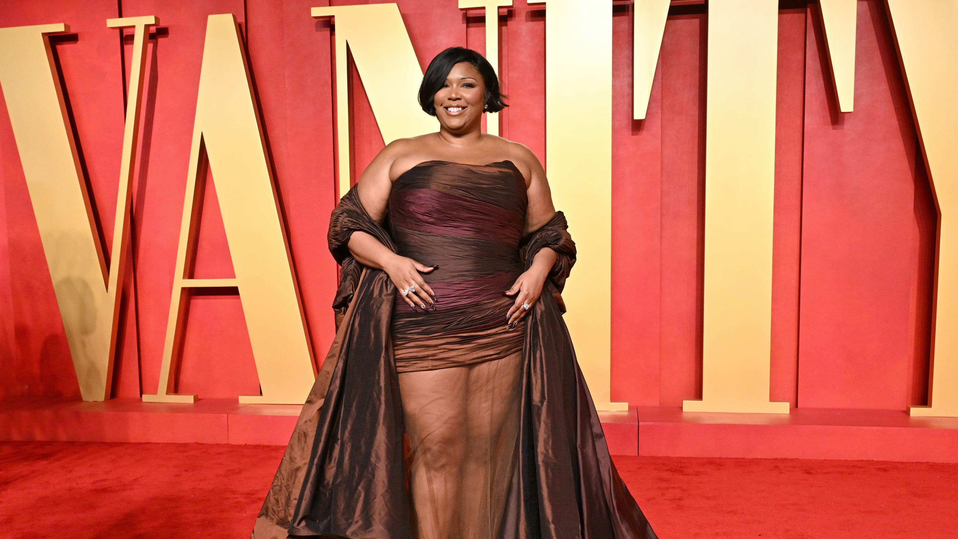 Lizzo's Post-Weight Loss Transformation: Red Carpet Debut At The Oscars Lizzo's Post-Weight Loss Transformation: Red Carpet Debut At The Oscars