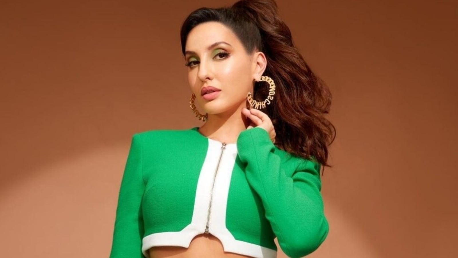 Nora Fatehi's Red Bikini Beach Photos: Bollywood Actress Sizzles Nora Fatehi's Red Bikini Beach Photos: Bollywood Actress Sizzles