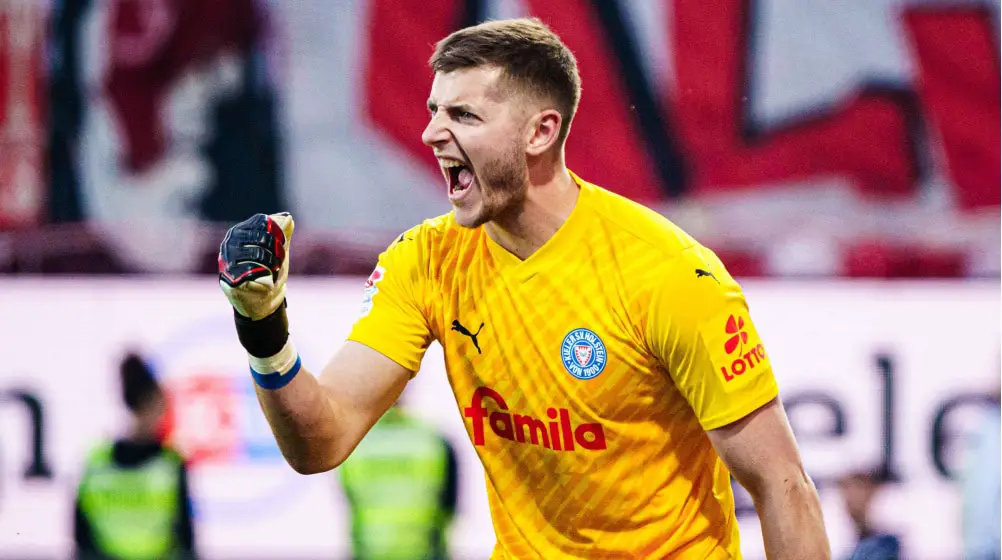 Relegation Battle: Holstein Kiel Earns Crucial Draw Against Champions League-Chasing Mainz Relegation Battle: Holstein Kiel Earns Crucial Draw Against Champions League-Chasing Mainz