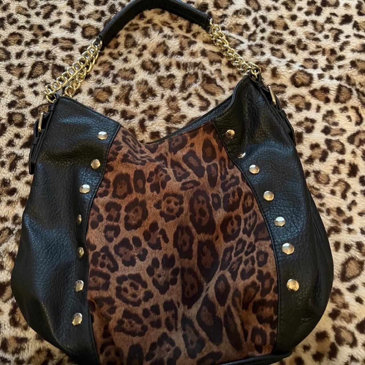 Spotted: Jessica Simpson In Cheetah Print And Blue Fur Coat At The Airport Spotted: Jessica Simpson In Cheetah Print And Blue Fur Coat At The Airport